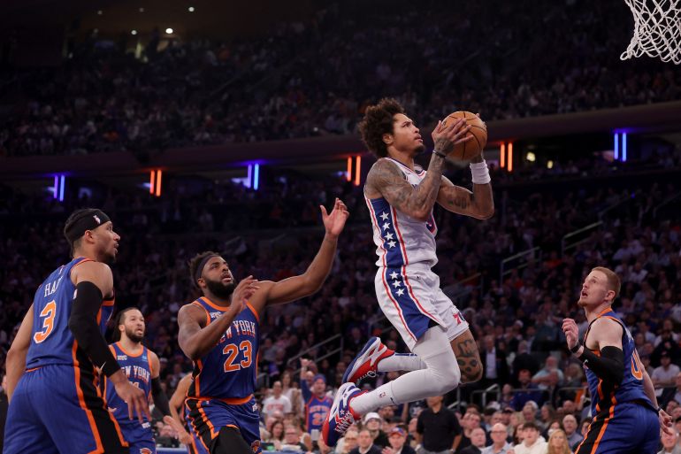 Philadelphia 76ers guard Kelly Oubre Jr drives to the basket against New York Knicks
