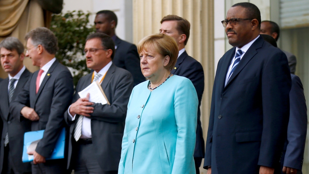 PM Hailemariam's comments come as Germany's Merkel visits troubled country and urges an opening of political space.
