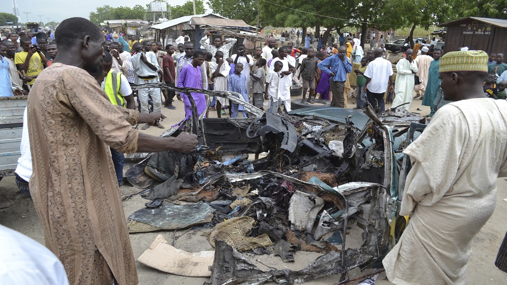 Attacker detonates explosive device in a car in northeastern Maiduguri, leaving at least eight people dead.