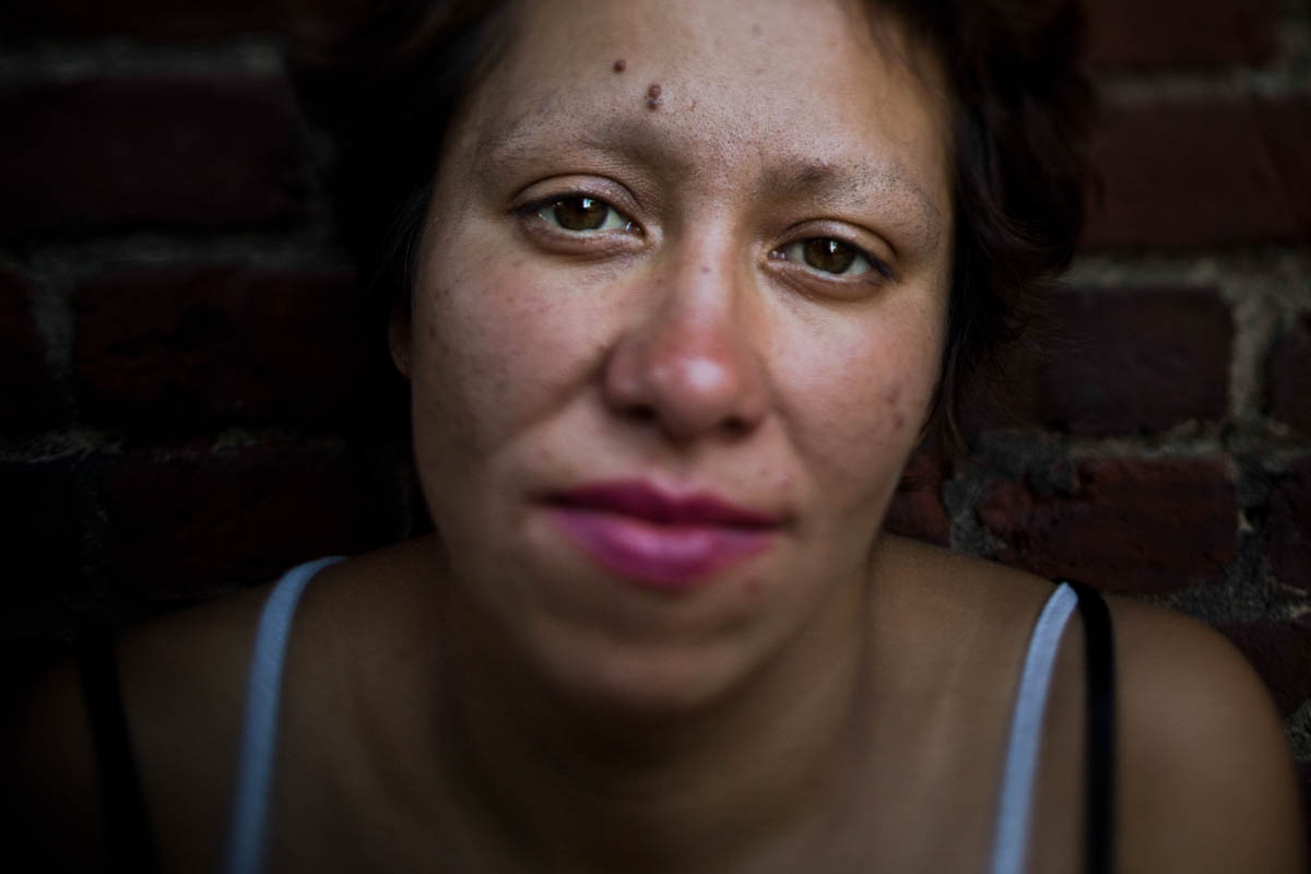 Alicia Adara, 33, on September 27 in Seattle. Adara said she ended up on the street after losing a custody fight for her two children with her ex-husband. 'I don't do shelters. I feel like I'm in jail,' she said. 'I've been like basically a prisoner all my life. I need to do this. I need to be out here. It's freedom.' [Jae C. Hong/AP Photo]