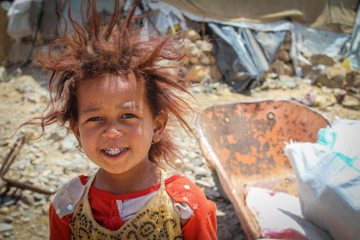 Ahlam, 4, has spent two years in an informal settlement outside Houth in northern Yemen, living in extremely dire conditions. Her family fled from Saada in 2015 after their neighbourhood came under attack. [Alvhild Stromme/NRC/Al Jazeera]