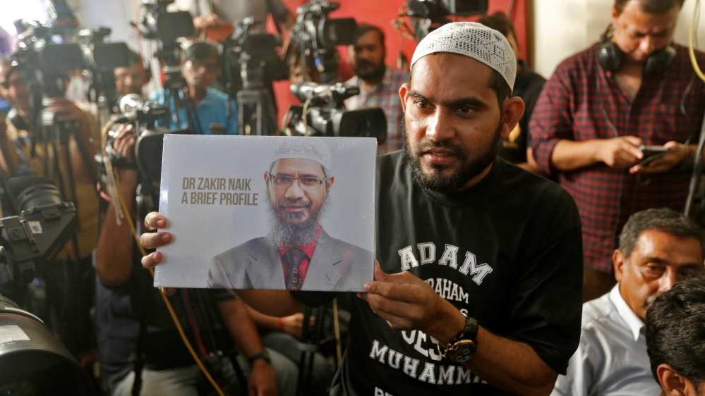 Why does India want to arrest preacher Zakir Naik? - Aljazeera.com