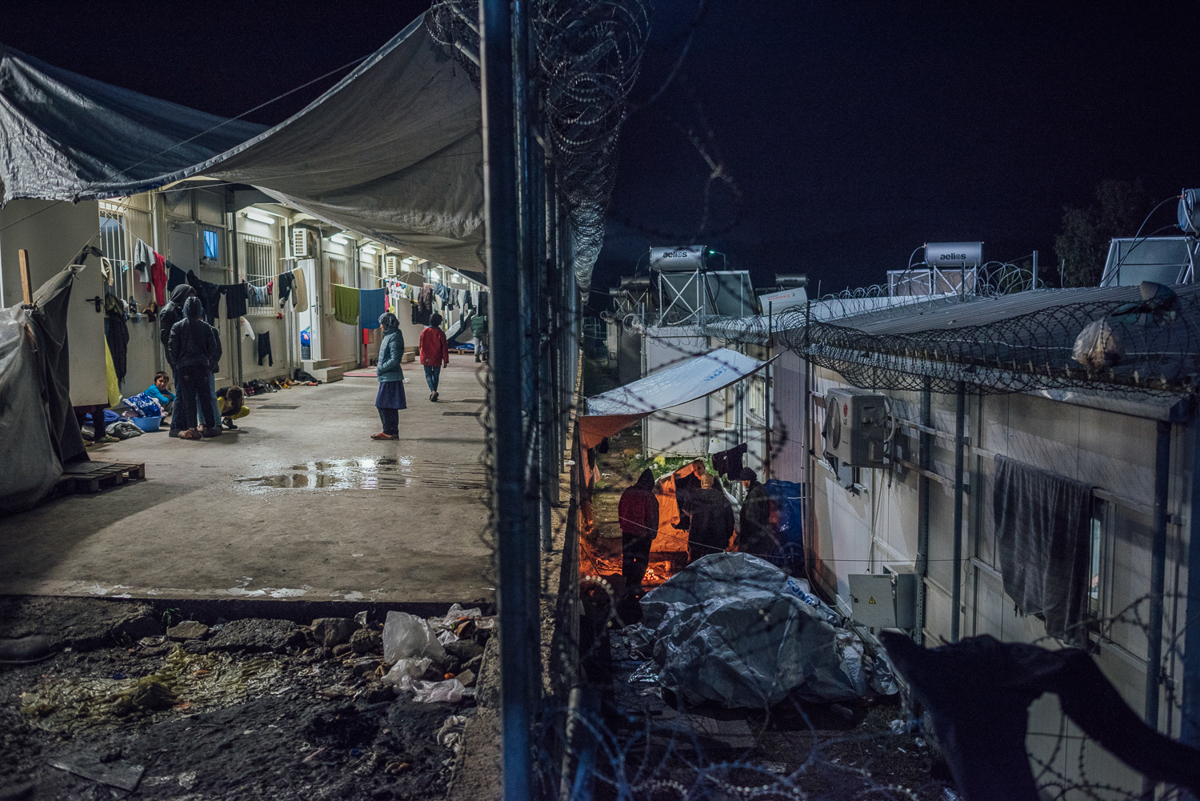 Some residents live in containers, but even here the heating system is not working all the time. A few people seek protection between the structures and build up tents there. [Kevin McElvaney/Al Jazeera]