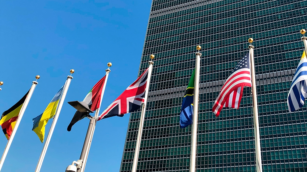 Flags fly outside the United Nations headquarters during the 74th session of the United Nations General Assembly, Saturday, Sept. 28, 2019.  At this year's annual gathering at the United Nations, well