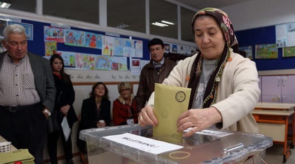 More than 54 million people are registered to vote at 175,000 stations on Sunday [Burhan Ozbilici/AP]