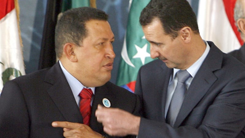 Hugo Chavez (left) has chosen to steer the Syrian-Venezuelan community into his own corner while jettisoning any notion of a human-rights oriented foreign policy [EPA]