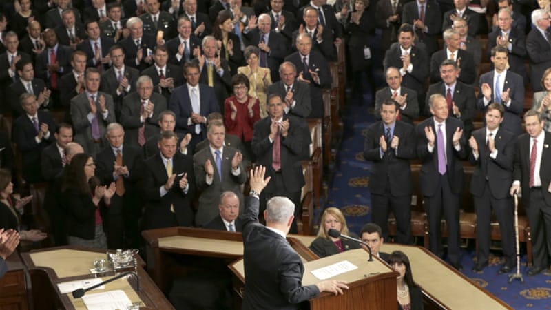 Israeli Prime Minister Benjamin Netanyahu was greeted at the US Congress by a long standing ovation [AP]
