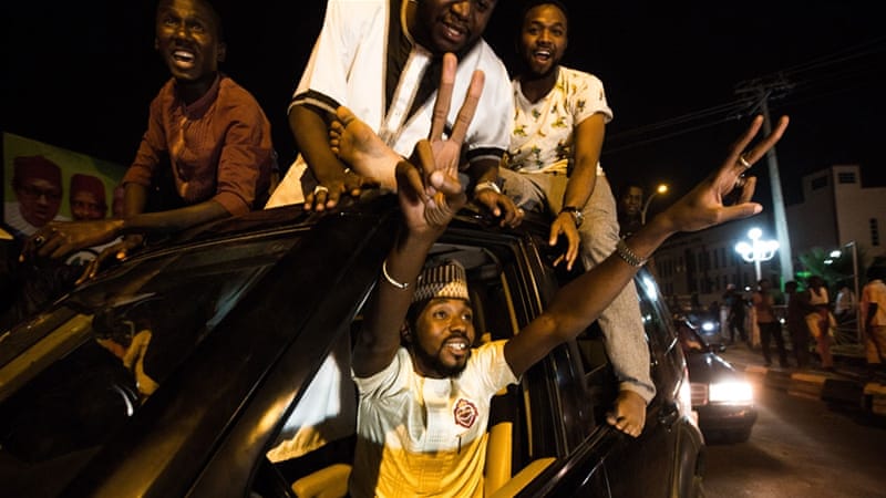 The announcement of Buhari's win has been greeted with celebrations across the country [Tom Saater/Al Jazeera]