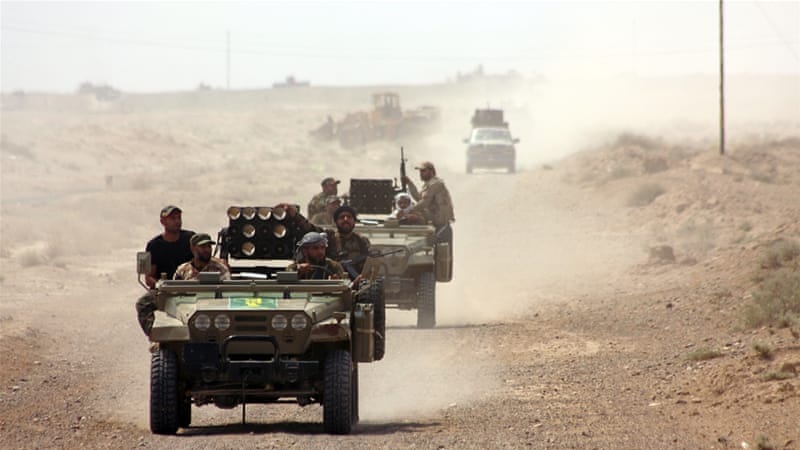 Iraqi security forces deploy northwest of Baghdad, during an operation aimed at cutting off ISIL in Anbar [AFP]
