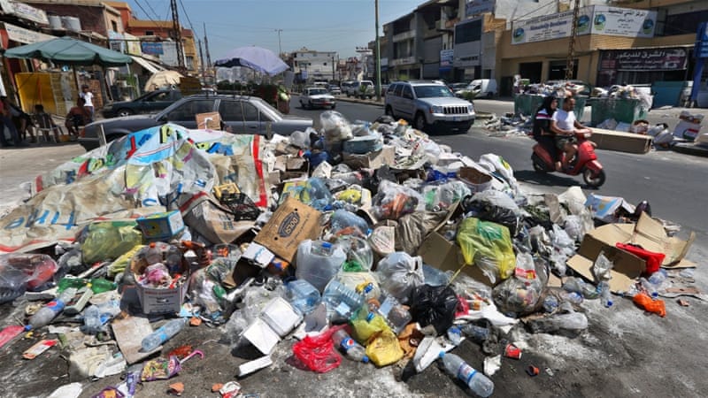 The stench of uncollected refuse in the streets of Beirut is a stark reminder of the crisis of government afflicting Lebanon [AP]