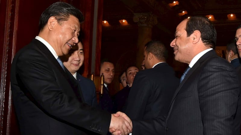 Egyptian President Abdel Fattah el-Sisi greets Chinese President Xi Jinping in Cairo, Egypt [REUTERS]