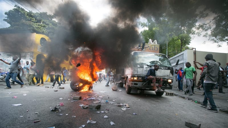 Violent demonstrations erupted in Haiti after elections were postponed indefinitely [Bahare Khodabande/EPA] 