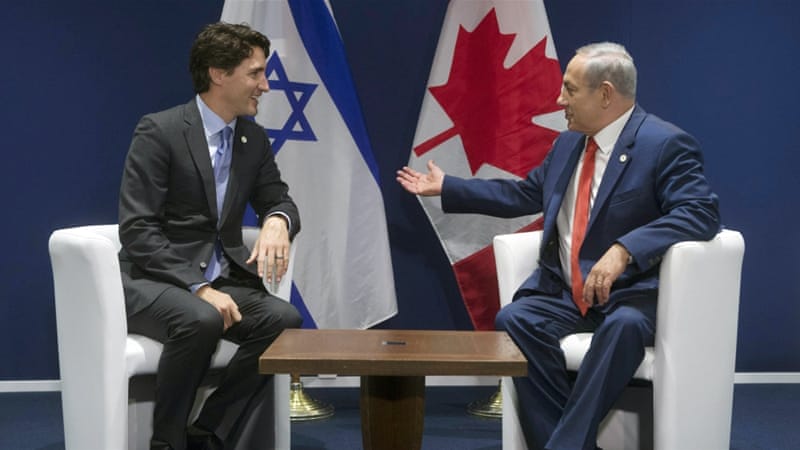 Israel's Prime Minister Benjamin Netanyahu speaks with Canada's Prime Minister Justin Trudeau [AP]