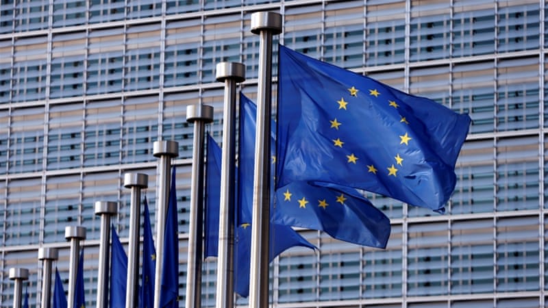 European Union flags flutter outside the EU Commission headquarters in Brussels, Belgium [Reuters]