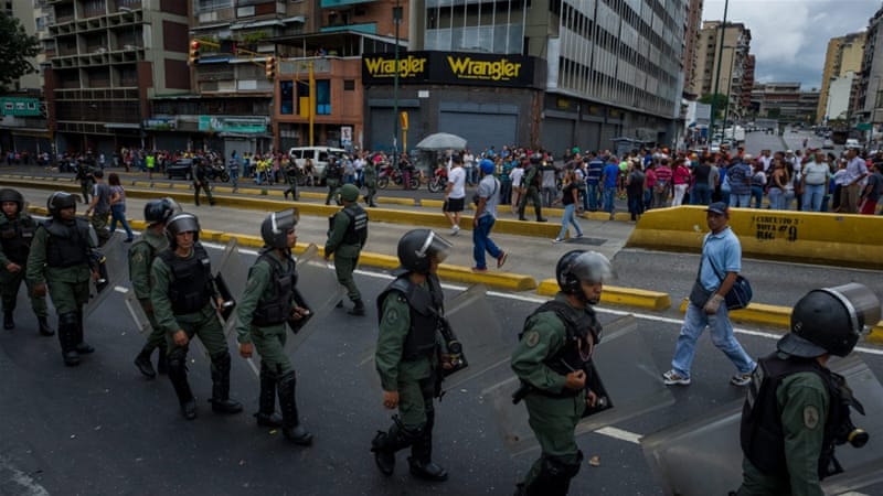 Maduro's opponents say Venezuela faces severe unrest in the referendum's absence [EPA]