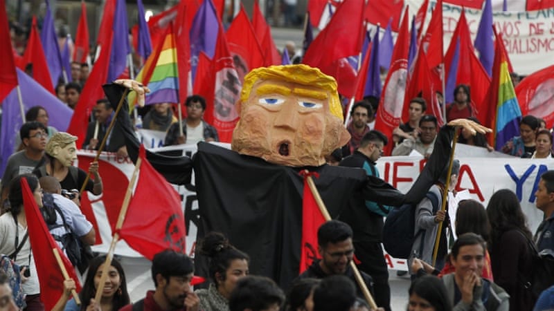 A group of demonstrators protest against the inauguration of US President Donald Trump in Mexico City on January 20 [EPA/Mario Guzman]