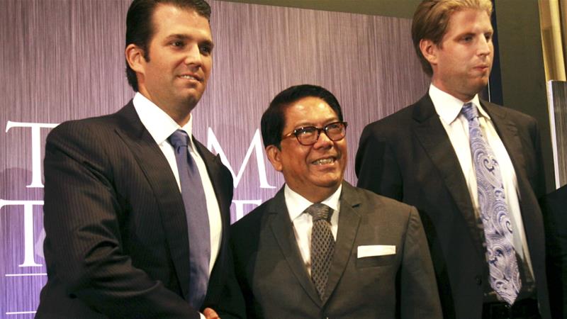 Donald Trump Jr and Eric Trump pose with local developer Jose Antonio during a press conference on the launching of Manila's Trump Tower project worth $150m on June 26, 2012 [AP Photo/Pat Roque]