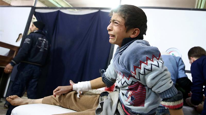 A wounded boy in a hospital in Douma after an air raid on the rebel-held town of Misraba in Eastern Ghouta [Bassam Khabieh/Reuters]