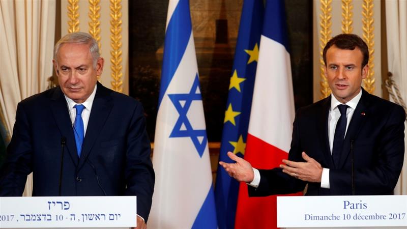 Macron (right) called on Netanyahu to negotiate with the Palestinians [Reuters]
