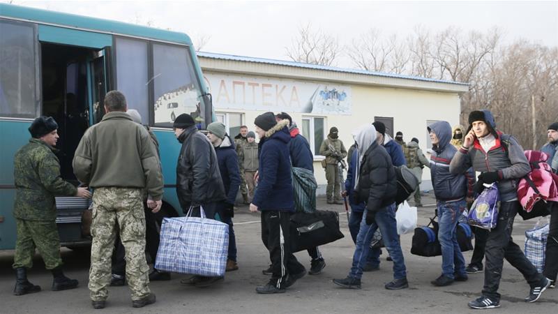The prisoners were exchanged in Ukraine's eastern Donetsk region [Valentyn Ogirenko/Reuters]