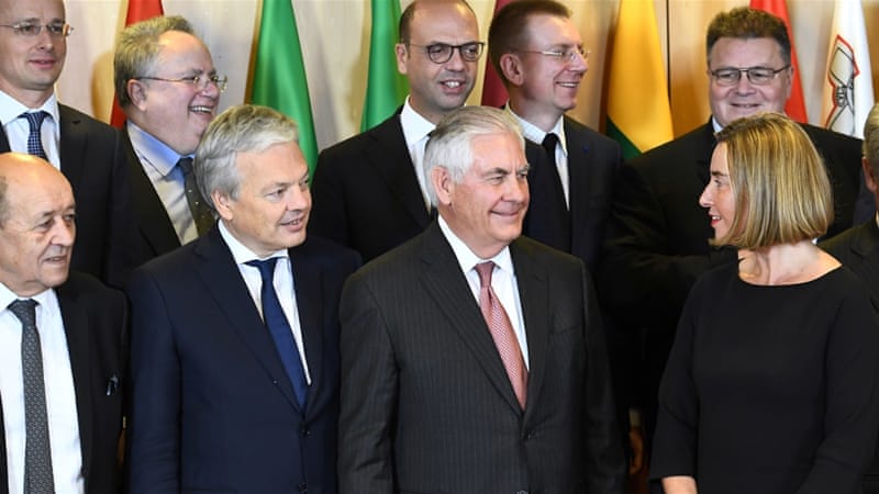 Tillerson, centre, met the 28 EU states' foreign ministers in Brussels on Tuesday [Emmanuel Dunand/Reuters]