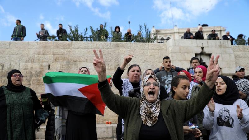 Palestinians shout slogans during a protest following US President Donald Trump's announcement that he has recognised Jerusalem as Israel's capital [Ammar Awad/Reuters]