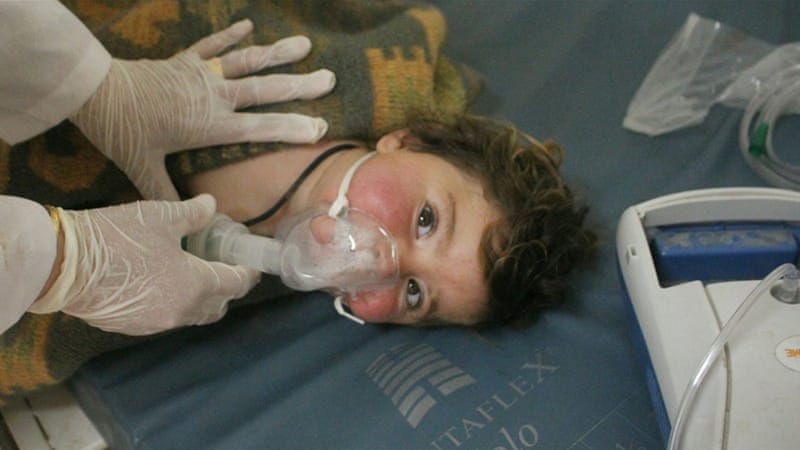 A child receiving treatment at a field hospital after an alleged chemical attack in the rebel-held town of Khan Sheikhoun in north Idlib province. [EPA] 
