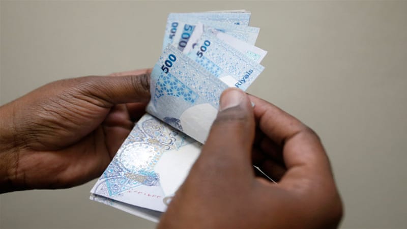 This week the riyal traded between offshore banks as low as 3.81 to the US dollar [Fadi al-Assaad/Reuters]