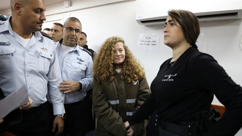 Ahed Tamimi, 16, was arrested last month during overnight raid on her home in occupied West Bank village of Nabi Saleh [Ammar Awad/Reuters]