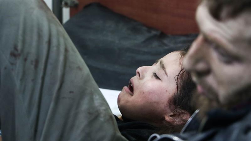 A Syrian girl lies on a stretcher at a hospital after air raids targeted her hometown of Arbin in Eastern Ghouta on February 06 [Anadolu/Diaa Al Din]