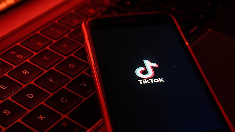 A bill proposed by Republican Senator Josh Hawley would ban federal employees from using social media app TikTok on government-issued devices [Lam Yik/Bloomberg]