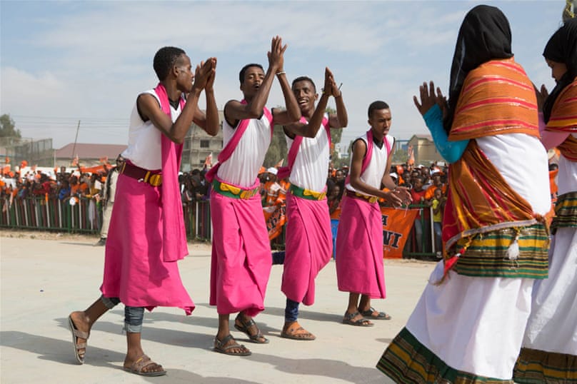 Traditional Somali dancers perform at a Waddani rally in Freedom Park, Hargeisa. Religious leaders expressed concern to the National Electoral Commission (NEC) about what they consider to be ‘un-Islamic behaviour’ during the campaigns, with the playing of music and men and women dancing together. The NEC however, let the rallies go ahead, arguing that the right to campaign is written into the constitution. [Kate Stanworth/Saferworld/Al Jazeera]