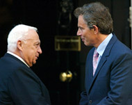 Sharon (L) wants Blair (R) to boycott Arafat