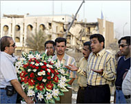 March organiser Sadeq Al-Timimi (R) expresses Iraqis' regret 