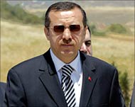 Prime Minister Erdogan is accusedof trying to discredit Cem