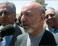 Afghan President Hamid Karzaiwants peacekeepers to operate outside of Kabul