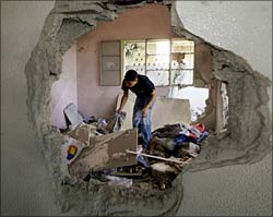 A common tactic of Israeli troops is to blasttheir way through Palestinian homes. Aftersuch incidents, residents are left to salvagewhatever personal belongings remain.