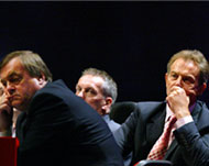 Blair (R) and Deputy PM John Prescott are at odds over ID