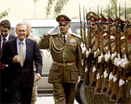 Donald Rumsfeld inspects Afghan guard of honour