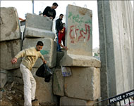 Saib Uraiqat says wall ''separates Palestinians from Palestinians'' 
