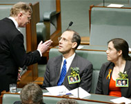 Green Senator Bob Brown (C) waswarned for heckling Bush