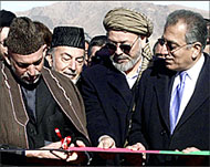 President Hamid Karzai (L) opens a US-funded highway 