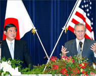 The media question Rumsfeld andhis Japanese counterpart in 2003