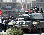 The US army patrols the streetsof al-Sadr city in Baghdad 