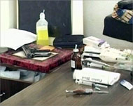 Dr al-Basri's pistol beside his medical equipment
