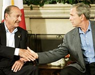 Chirac (L) rejected Bush's idea ofof a bigger role for NATO  in Iraq