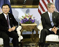PM Shinawatra is seen by someThais as too supportive of Bush