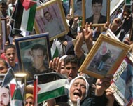 Many Palestinians attended therally with photos of jailed relatives