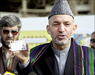 Some voters say they are beingcoerced to get a 'Karzai card'