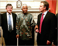 Mandela (C) is to talk to Brown(L)about tackling world poverty